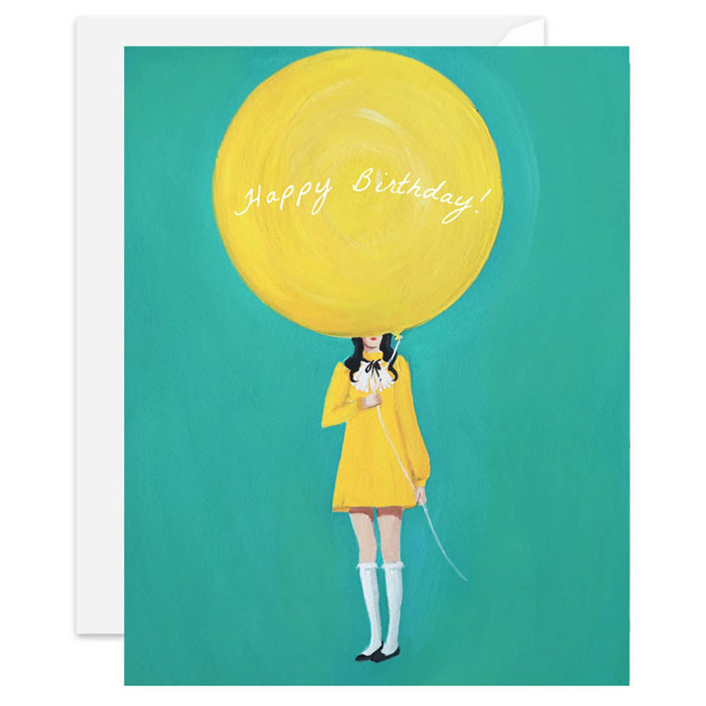 janet hill Greeting card with illustration of a person holding a large yellow balloon with 'Happy Birthday!' text on a teal background.