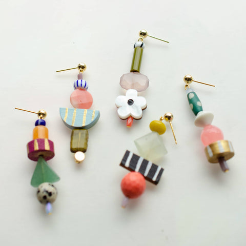Colorful beaded earrings by Jill Makes featuring vibrant beads and intricate design, perfect for adding a pop of color to any outfit.