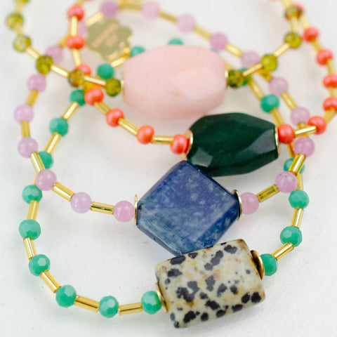 Colorful gemstone stretchable bracelet by Jill Makes featuring vibrant beads and a flexible design for comfortable wear.