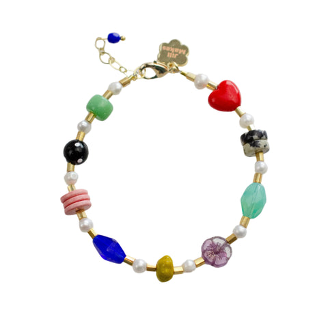 Colorful handmade beaded bracelet from Jill Makes' Frida collection, featuring intricate beadwork and vibrant design details.