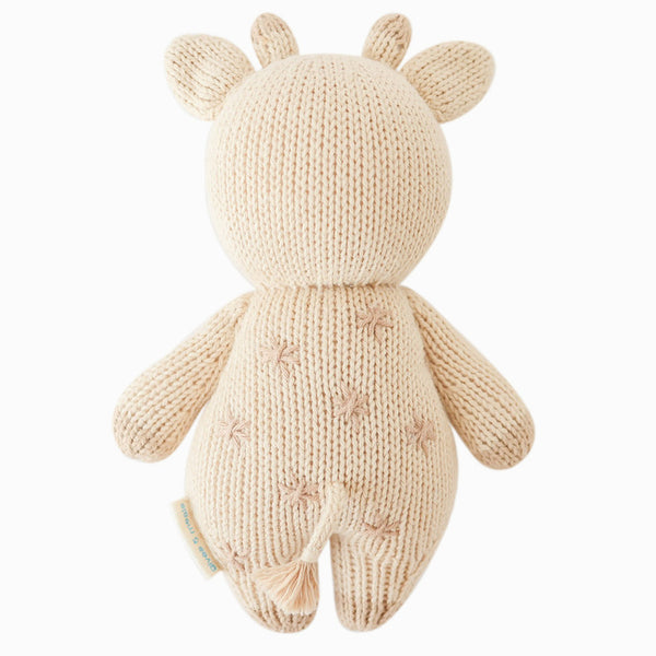 Soft baby giraffe hand-knit doll by Cuddle + Kind, featuring a cute giraffe design perfect for cuddling and play.
