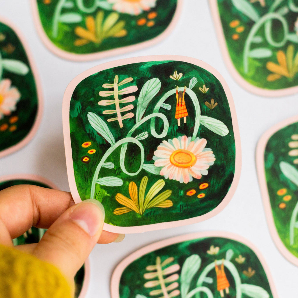 Vinyl sticker from Wild Pencil Studio featuring the "Growing Together" design with colorful, hand-drawn floral and plant illustrations.