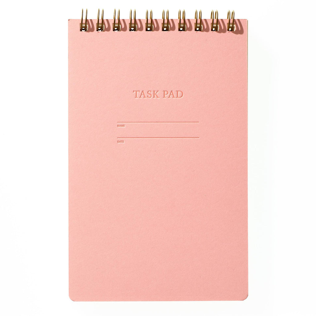 Pink Lemonade Task Pad Notebook by Shorthand Press with lined pages and a vibrant pink cover for note-taking and organization.