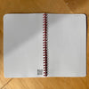 Caroline Clark mushroom pattern notebook with an illustrated mushroom cover and lined pages