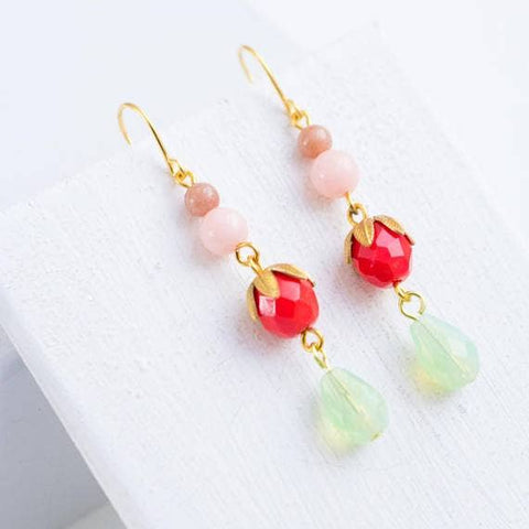 Nest Pretty Things Berry Bright Dangle Earrings featuring vibrant red berry-themed jewelry with silver hooks.