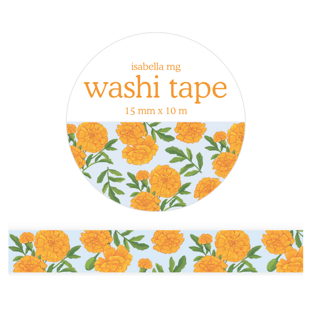 A roll of washi tape with a light blue background and a repeating pattern of orange marigold flowers and green leaves, shown with the brand label 'isabella mg washi tape 15 mm x 10 m' on a white background.