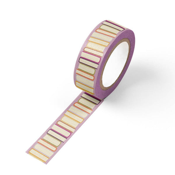 Decorative Book Stack Reading washi tape by Ruff House Print Shop, featuring colorful book illustrations on textured paper.