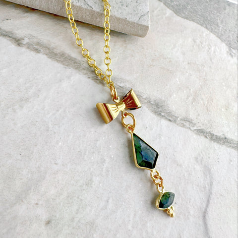 Freshie & Zero Bow Beauty necklace featuring a unique, handcrafted design with a delicate bow pendant on a fine chain.