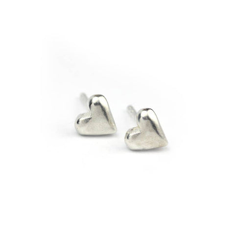 Heart-shaped handmade stud earrings by Marmalade Jewellery, featuring delicate craftsmanship and silver-tone metal.