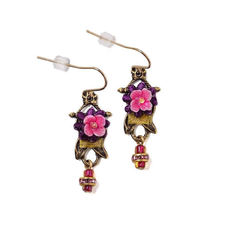 Pink rose dangle earrings by Elements Jill Schwartz featuring delicate floral design and silver hooks.