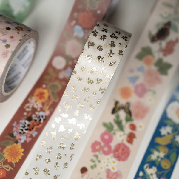 Gold Petite Flora Washi Tape by Botanica Paper Co. featuring delicate floral patterns on a gold background, ideal for crafts and decorating.