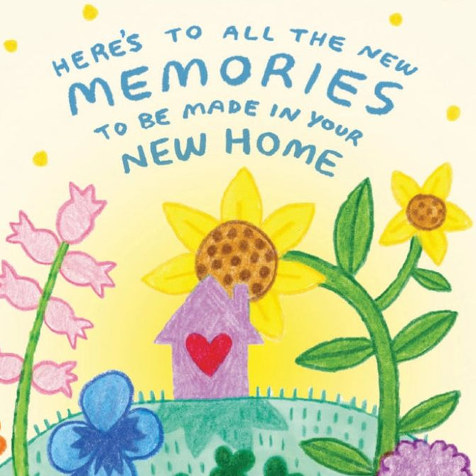 A square greeting card featuring a colorful hand-drawn illustration of flowers, a small house with a red heart, and the text 'HERE'S TO ALL THE NEW MEMORIES TO BE MADE IN YOUR NEW HOME' on a pale yellow background.