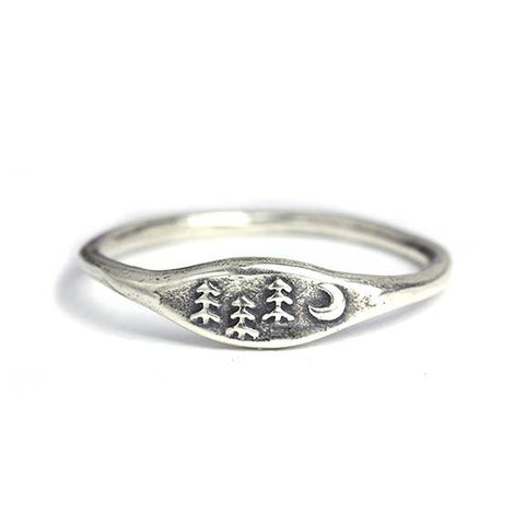 Forest handmade signet ring by Marmalade Jewellery featuring a detailed engraved forest scene on silver ring.