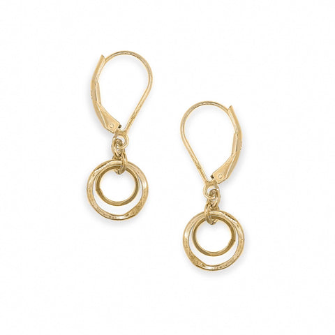 Tiny Spin earrings by Freshie & Zero featuring small, minimalist silver hoop earrings with a smooth, shiny finish.