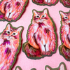Pink glitter kitty sticker by Katie Daisy, featuring a cute cat design with sparkling pink glitter details.
