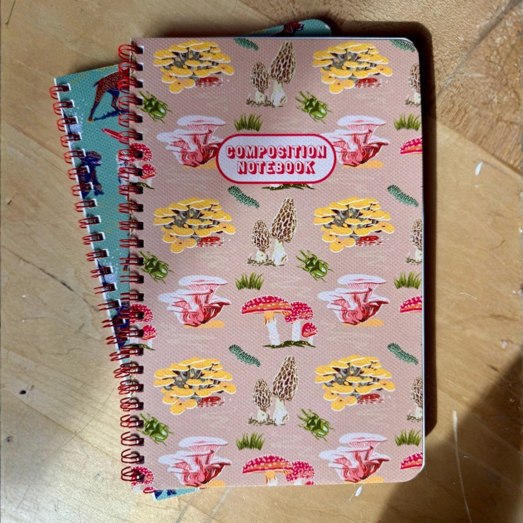 Caroline Clark mushroom pattern notebook with colorful fungi illustrations on the cover
