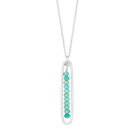 Freshie & Zero lyric necklace featuring a turquoise pendant, displayed on a chain with a simple, elegant design.