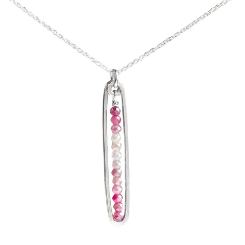 Freshie & Zero lyric necklace featuring a pink strawberry quartz pendant, delicate chain with elegant design.