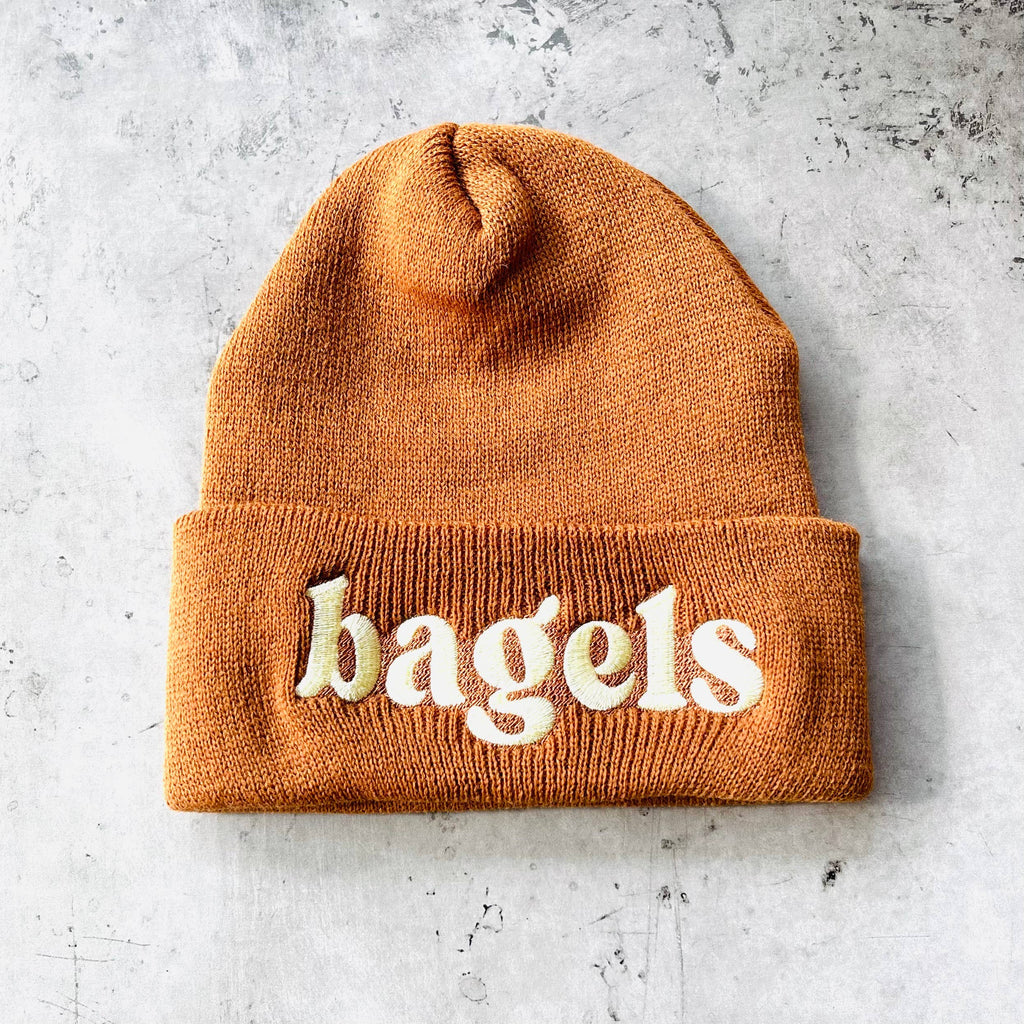 Embroidered beanie hat with bagel design by The Silver Spider, perfect for winter warmth and casual style.