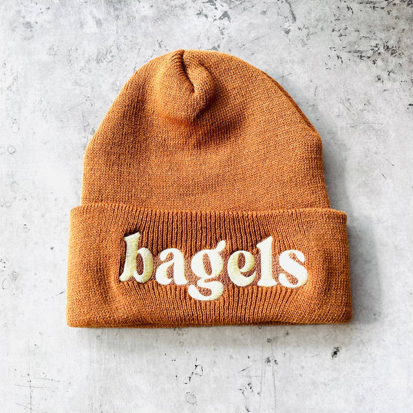 Embroidered beanie hat with bagel design by The Silver Spider, perfect for winter warmth and casual style.