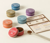 Vashon Island Coffee Dust sampler kit with six tins and tasting spoon