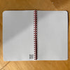 Caroline Clark camping trucks pattern notebook with colorful truck illustrations on the cover