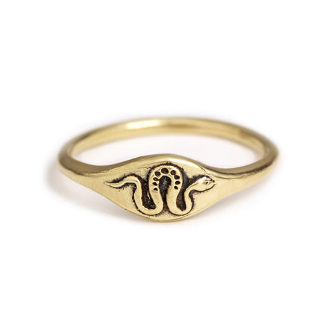 Handmade snake signet ring by Marmalade Jewellery, featuring a detailed snake design on a polished silver band.