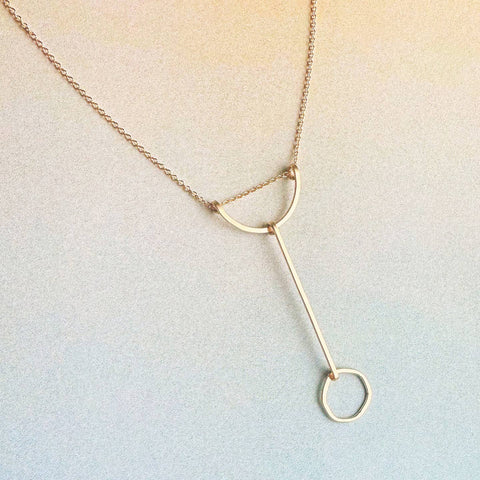 Freshie & Zero Modo necklace with delicate chain and minimalist pendant, stylish jewelry accessory for everyday wear.