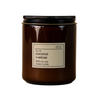 Dilo No. 05 Coconut + Vetiver candle in glass jar, showcasing the candle's textured surface and natural scent profile.