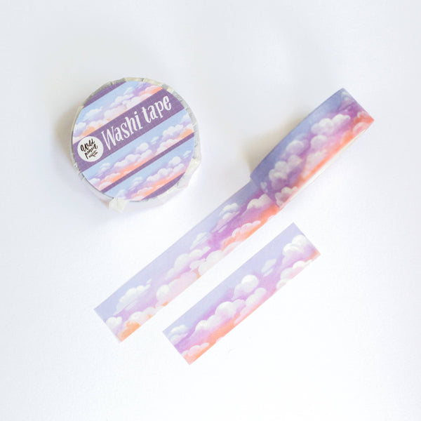 Watercolor Clouds Purple Sky Washi Tape by Wild Pencil Studio featuring a soft purple sky with cloud illustrations on adhesive tape.