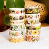 Decorative Wild Pencil Studio Washi Tape featuring a winter town pattern with snowflakes and cozy winter scenes.