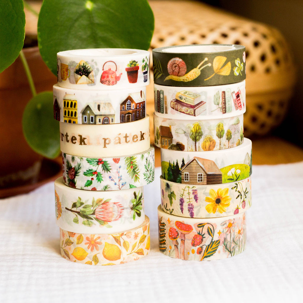 Decorative Wild Pencil Studio Washi Tape featuring a winter town pattern with snowflakes and cozy winter scenes.