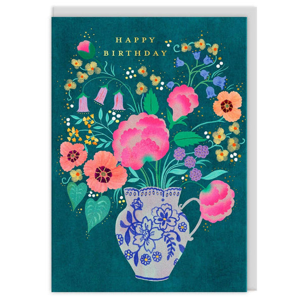 Flower vase with a happy birthday greeting card from Ohh Deer, featuring colorful floral design and cheerful message.