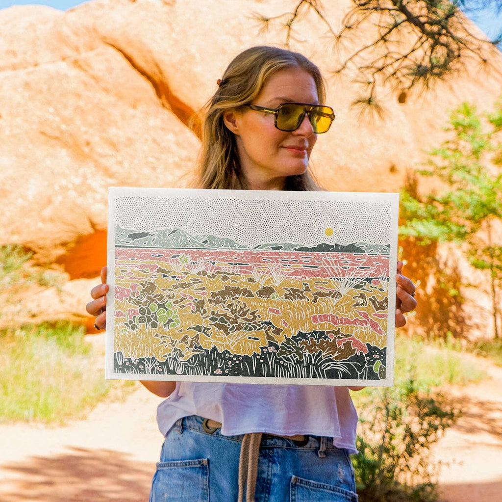 Caroline Clark New Mexico desert landscape art print featuring rugged terrain and warm southwestern tones