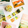 Washi Tape by Wild Pencil Studio featuring scenic landscape designs in soft pastel colors on a roll.