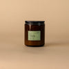 Dilo No. 10 Basil Mint Lavender Candle with a sleek glass holder, showcasing fresh herbs and floral scents.