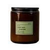 Dilo No. 10 Basil Mint and Lavender scented candle in a glass jar, with fresh herbs and lavender flowers around it.