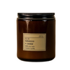 Dilo No. 03 Tobacco + Cedar Candle in a glass holder, featuring a warm, earthy scent with tobacco and cedar notes.