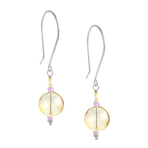 Butter yellow Medina Orb earrings from Freshie & Zero featuring round, glossy earrings with a smooth orb design.