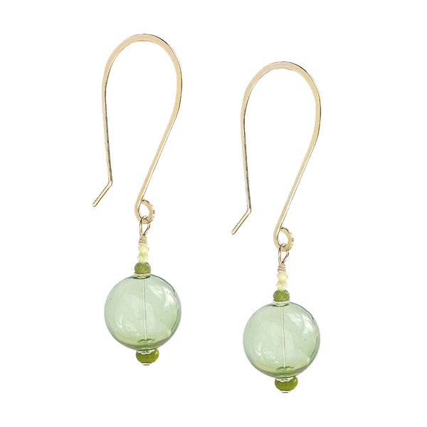 Green Medina Orb earrings by Freshie & Zero featuring round, textured earrings with a vibrant green finish on silver hoops.