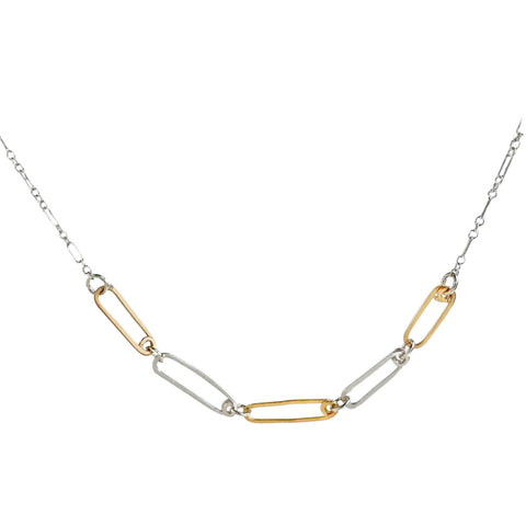 Golden Mini Reef Links Necklace by Freshie & Zero featuring small gold reef-shaped links on a delicate chain.