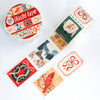 Decorative Washi Tape featuring Christmas stamp patterns by Wild Pencil Studio, perfect for holiday crafts and gift wrapping.