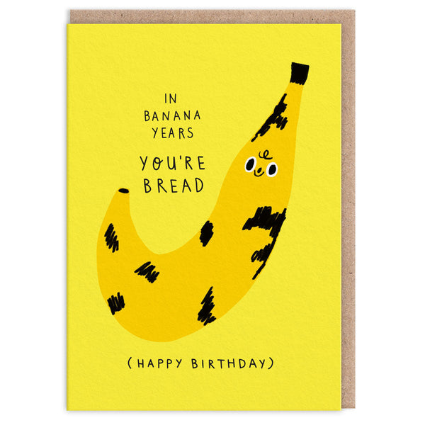 Birthday card with a banana illustration and humorous text on a yellow background
