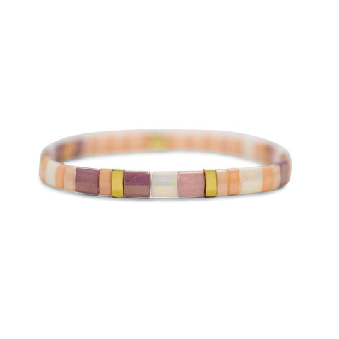 Stia Couture Morse Code Tila Bracelet with love message, featuring small beads spelling "LOVE" in Morse code, close-up view.