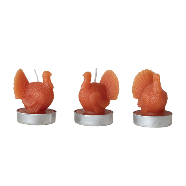 Set of nine orange turkey-shaped tealight candles from Creative Co-Op, perfect for festive holiday decoration.