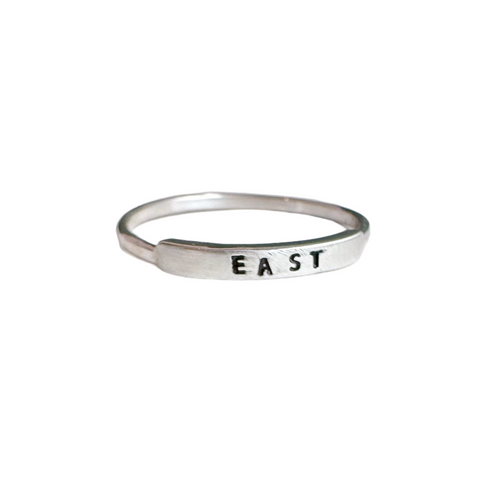 East handmade ring by Christina Kober featuring intricate design and silver finish, showcasing artisanal craftsmanship.