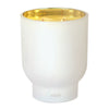 Toasted Vanilla Maeve glass candle in 21 oz container by Elum Designs, featuring a clear glass holder and vanilla scent.