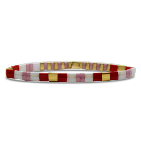 Stia Couture XOXO Morse Code Tila Bracelet featuring small silver beads and a subtle XOXO message in Morse code design.