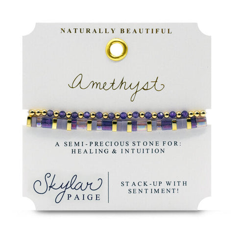 Healing stone bracelet set featuring amethyst beads from Stia Couture, displayed on a neutral background.