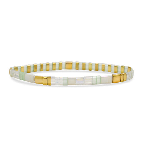 Stia Couture Morse code Tila bracelet with black cord and silver-tone beads, featuring engraved message in a minimalist design.